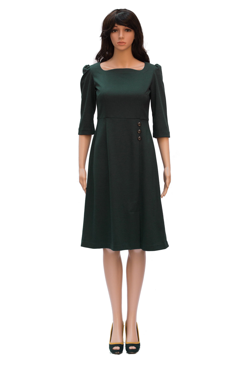 Formal apparel: Knee length green dress with three fourth sleeves and slit in knee